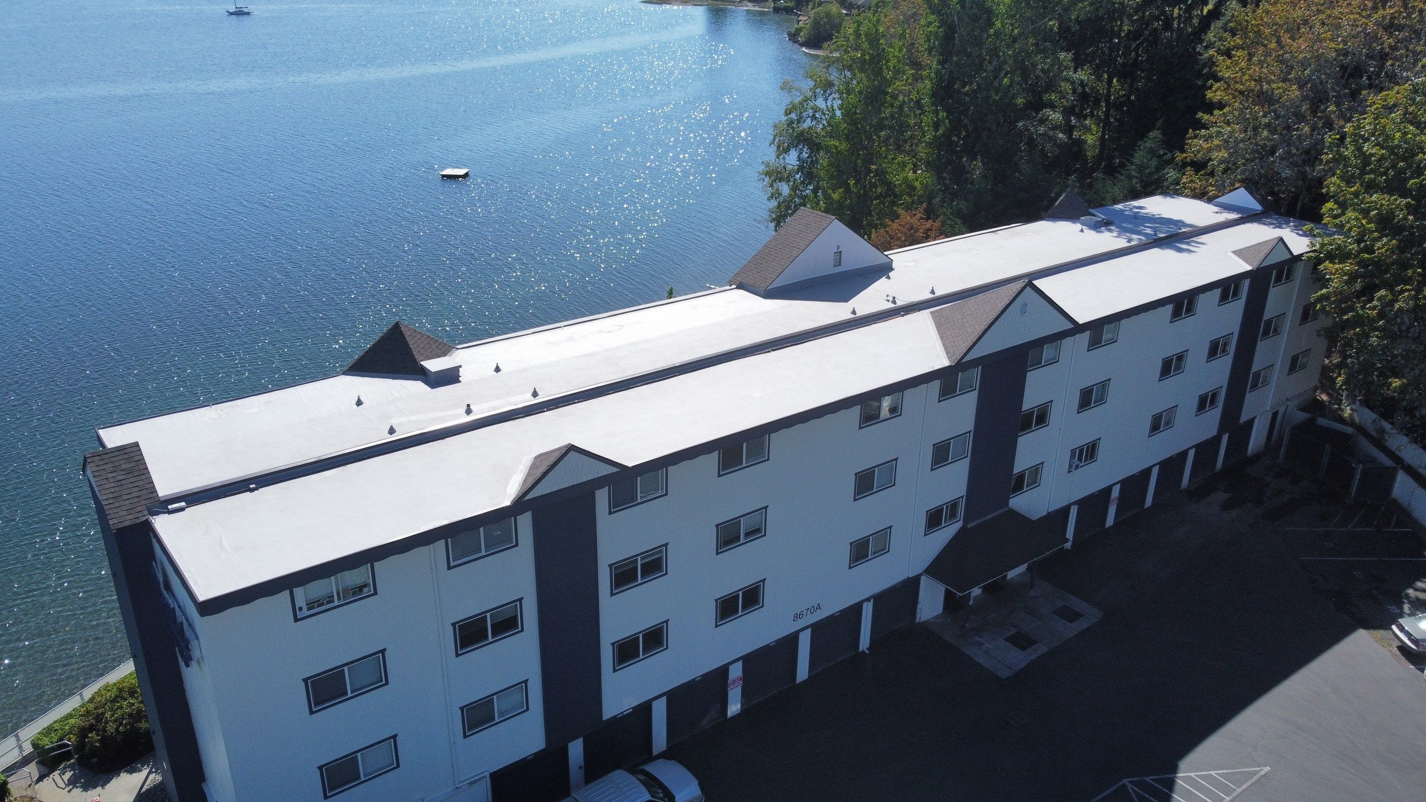 Professional Residential Flat Roofing Completed in Silverdale, WA Showcased in Photo.