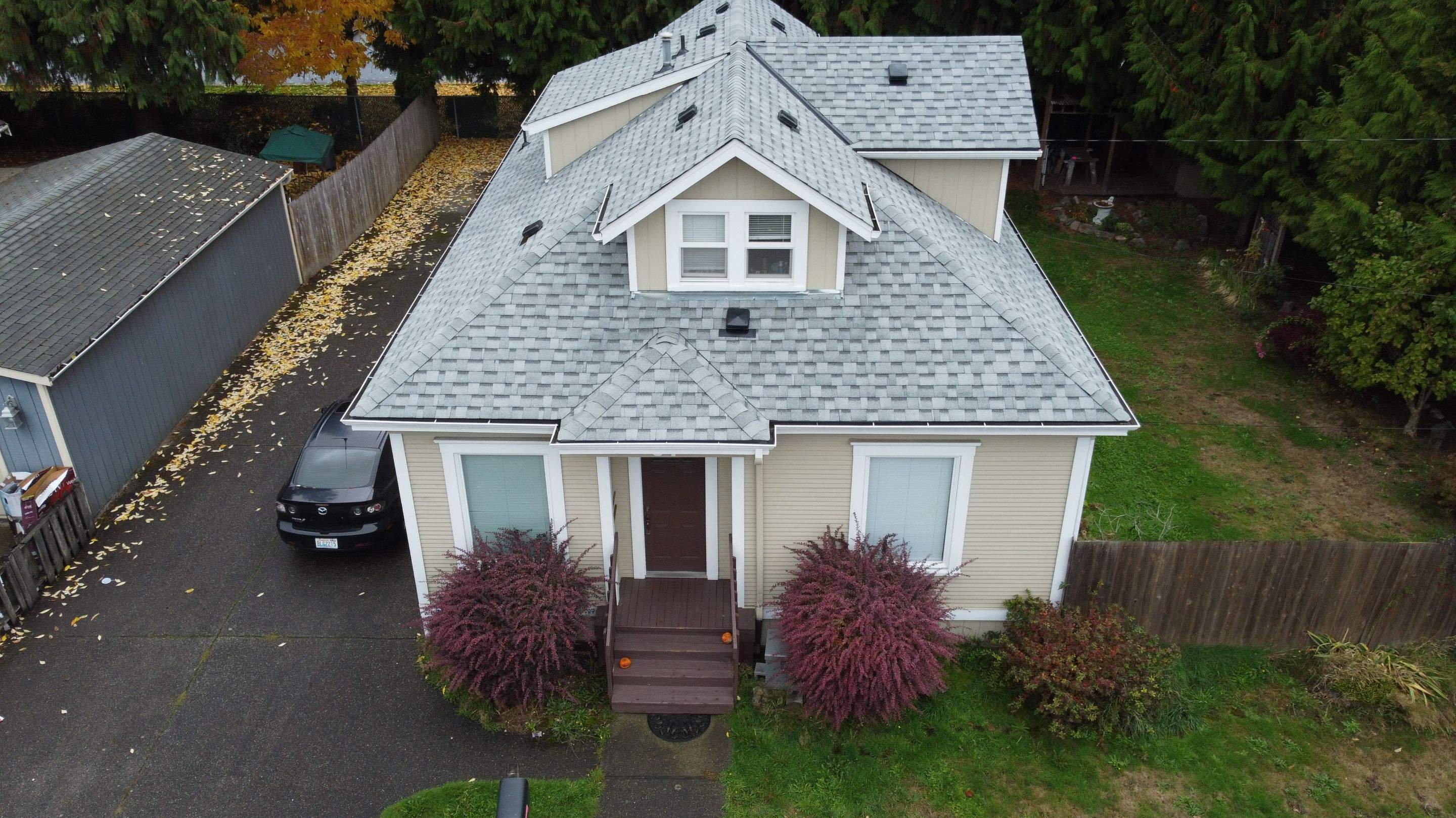 Completed Residential roofing in greater seattle with White to grey shingles. Residential Roof The Benefits of Energy-Efficient
