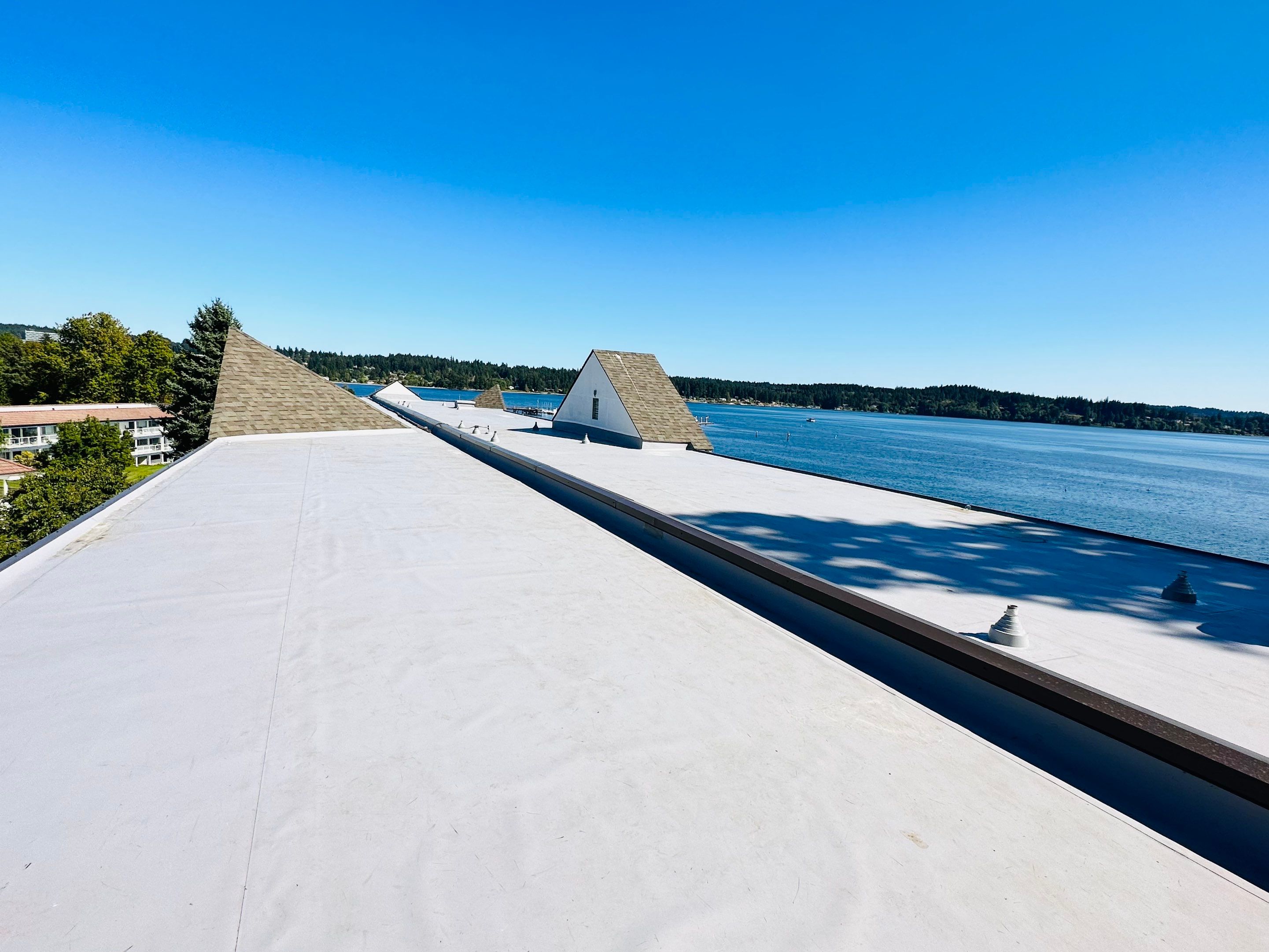 Finished residential flat roof in Des Moines, showcasing expert roofing skills and attention to detail.