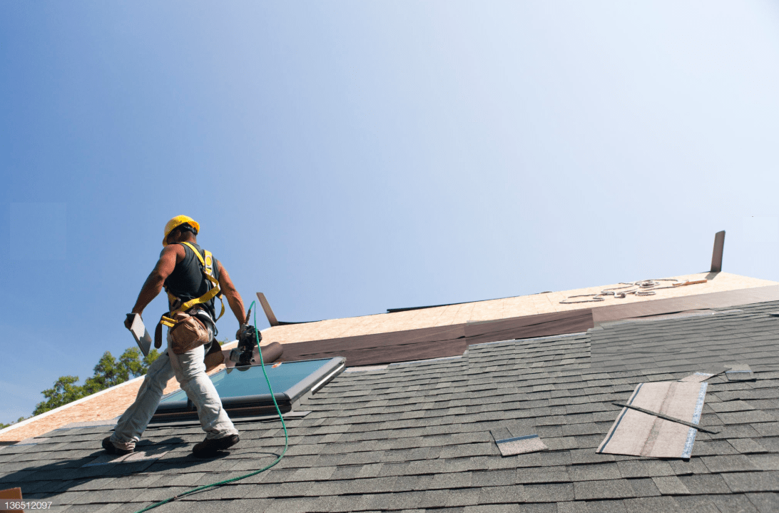 Roofer doing roof replacement