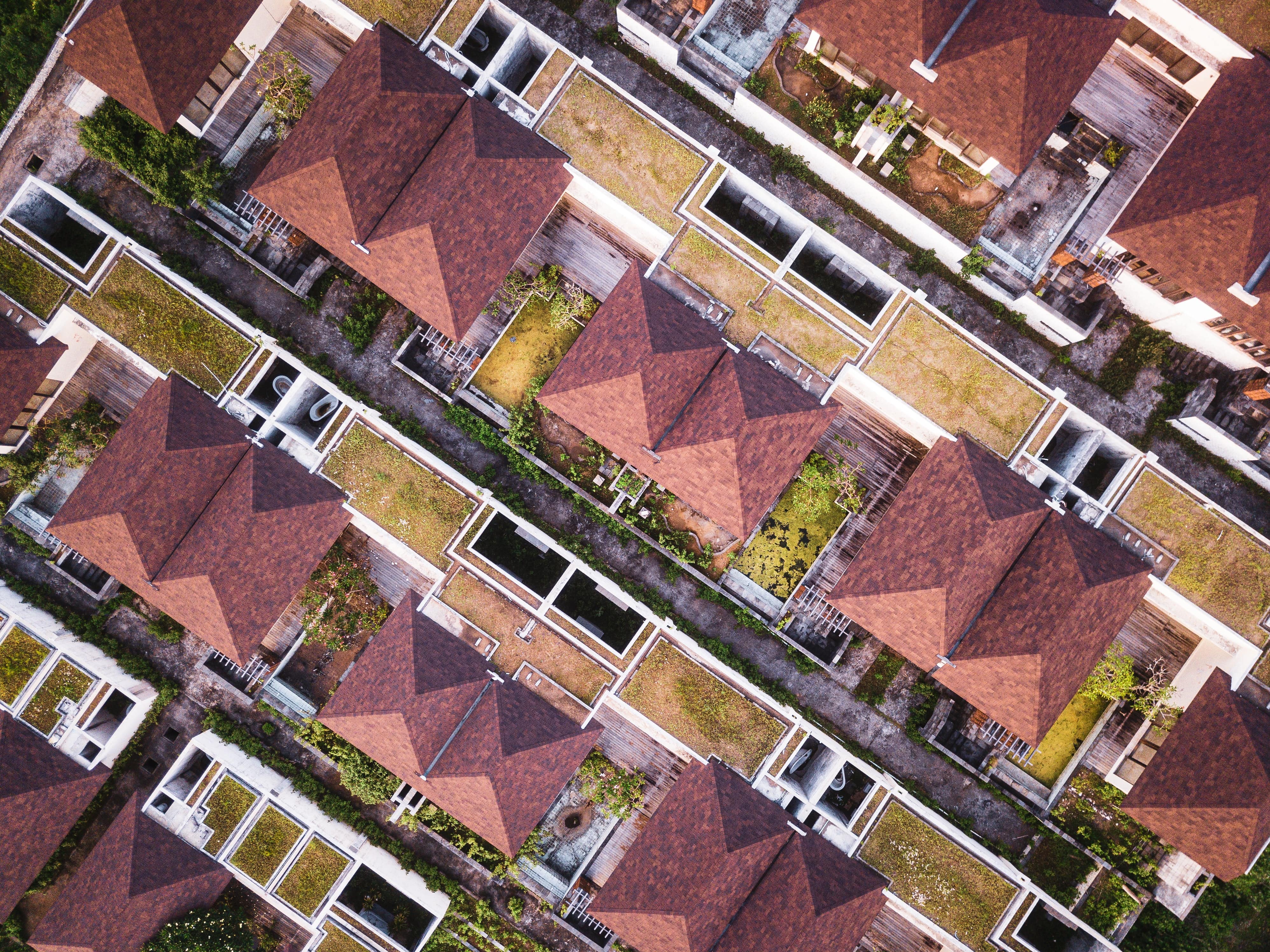 neighborhood view from drone Residential roofs Impact of roofing materials